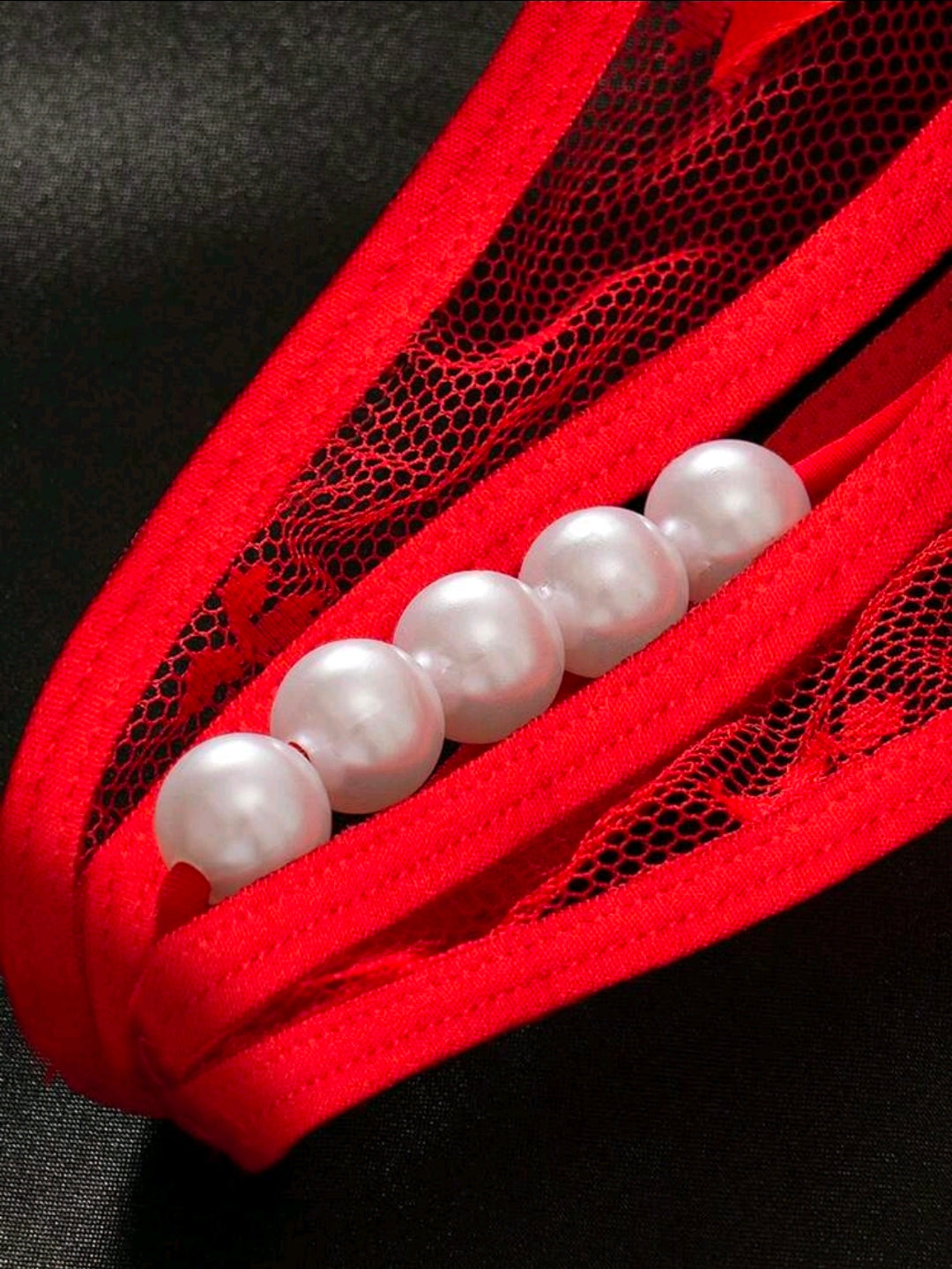 Tanga con abertura y Perlas